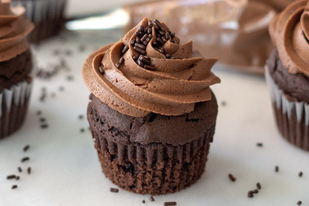 A close up of a double chocolate cupcake.