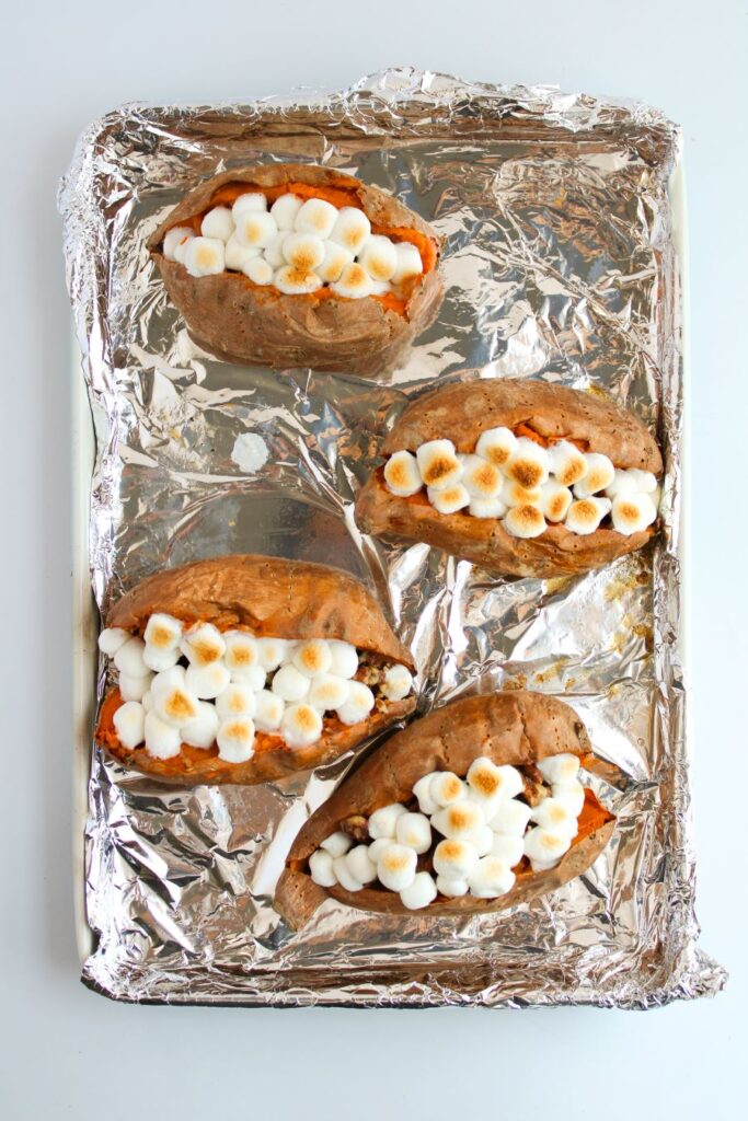 Stuffed Sweet Potatoes on a baking sheet.