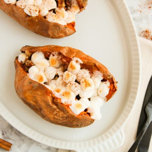 Stuffed Sweet Potatoes on a white plate.