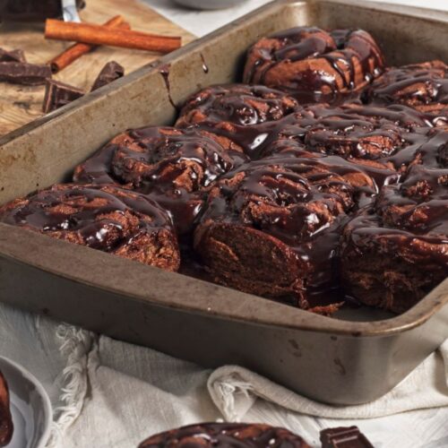 Chocolate Cinnamon Rolls in a baking dish.