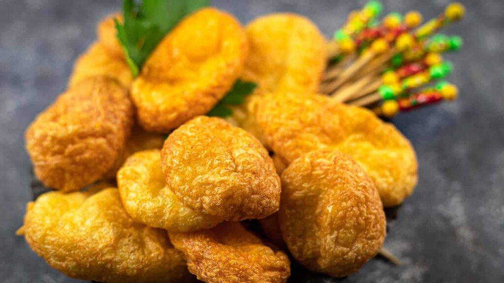 Cheese Puffs in a plate with fresh parsley.