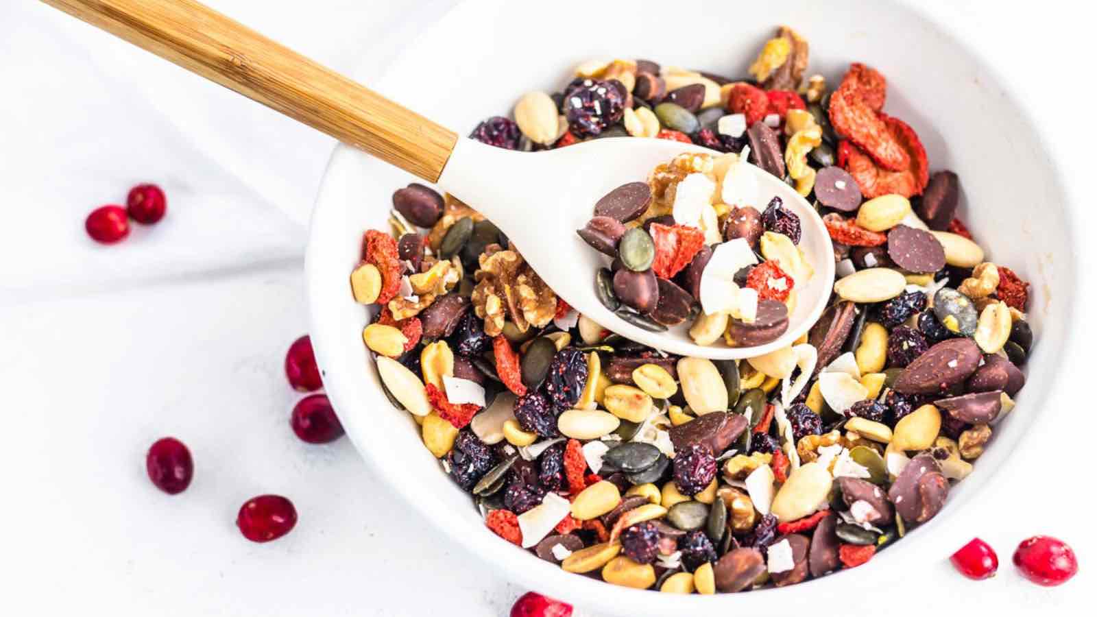 A bowl containing trail mix.