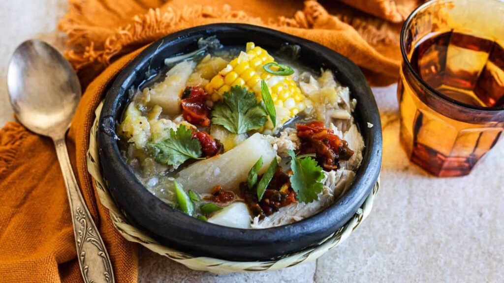 black bowl of chicken sancocho soup