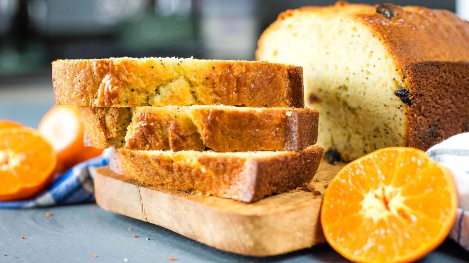 Cranberry clementine quick bread topped with orange glaze.