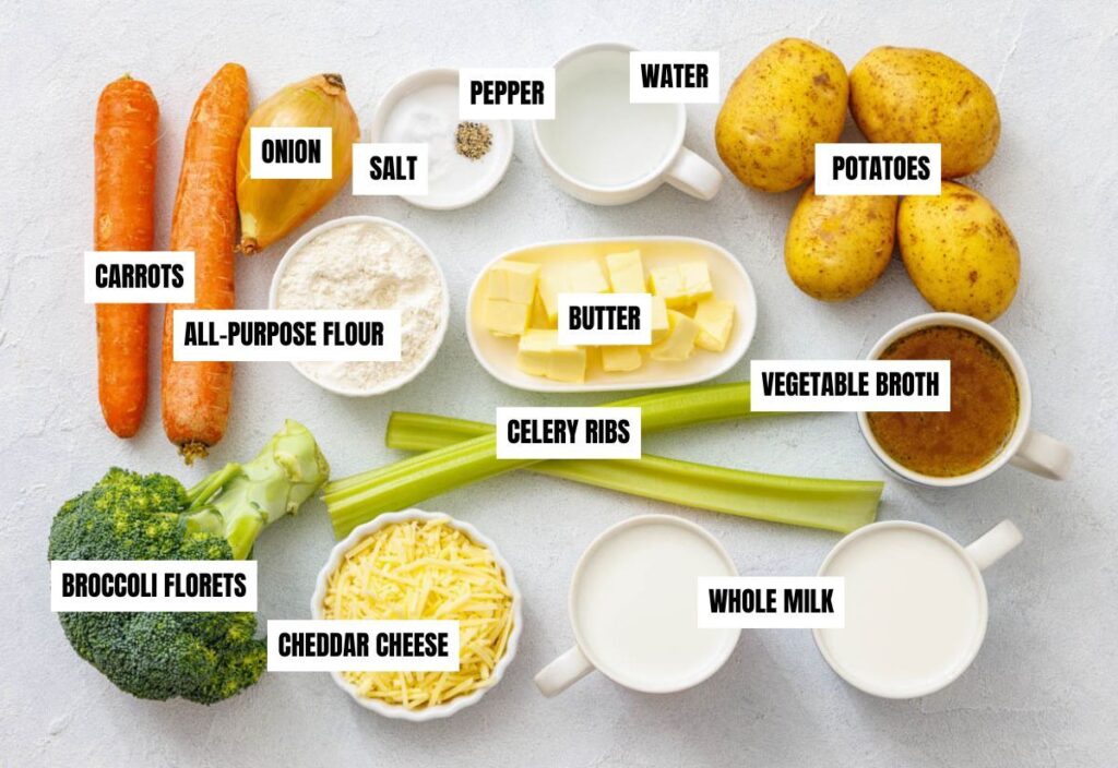 A collection of vegetables and ingredients for vegetable chowder on a table.