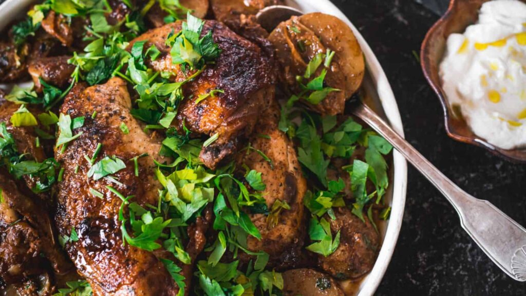 Oven-Baked Buttermilk Chicken and Potatoes on white platter