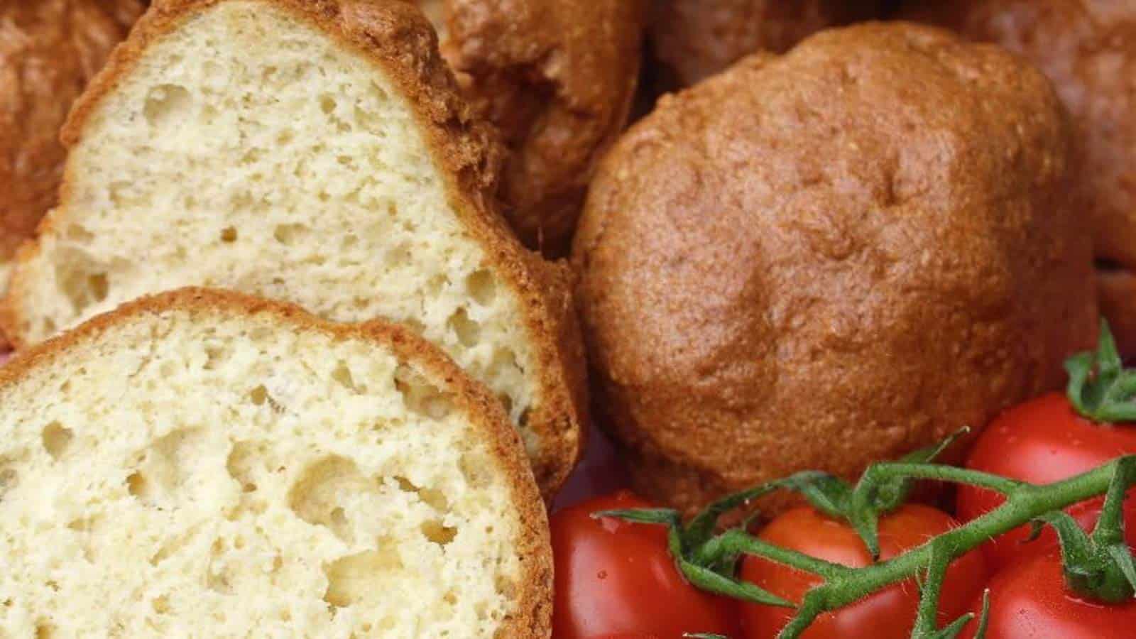 Low Carb Buns cut in half with cherry tomatoes.