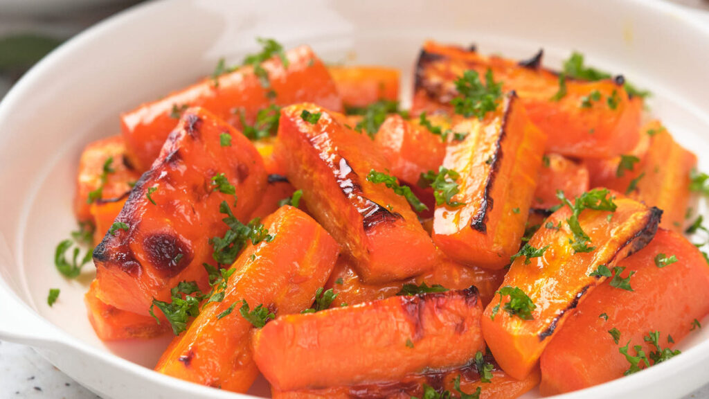 A plate of honey glazed carrots.