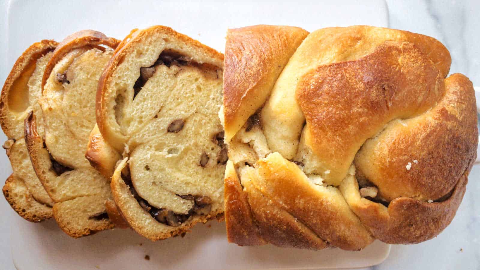 A sliced loaf of pean nutmeg bread.
