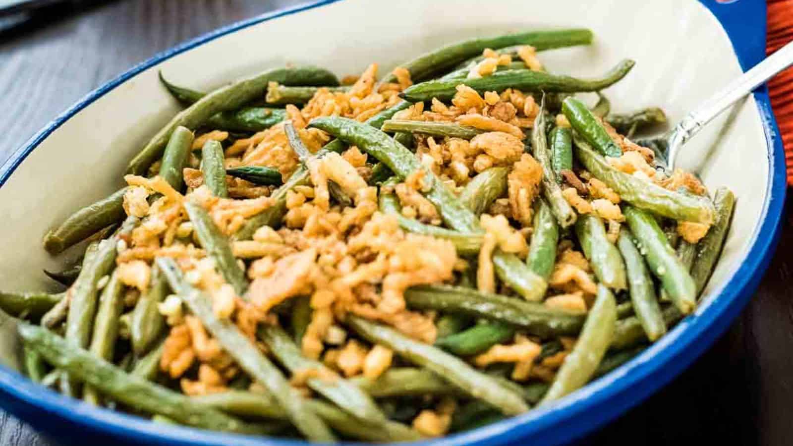 A delightful side dish of green beans topped with crispy fried onions, perfect for pleasing both adults and kids alike.