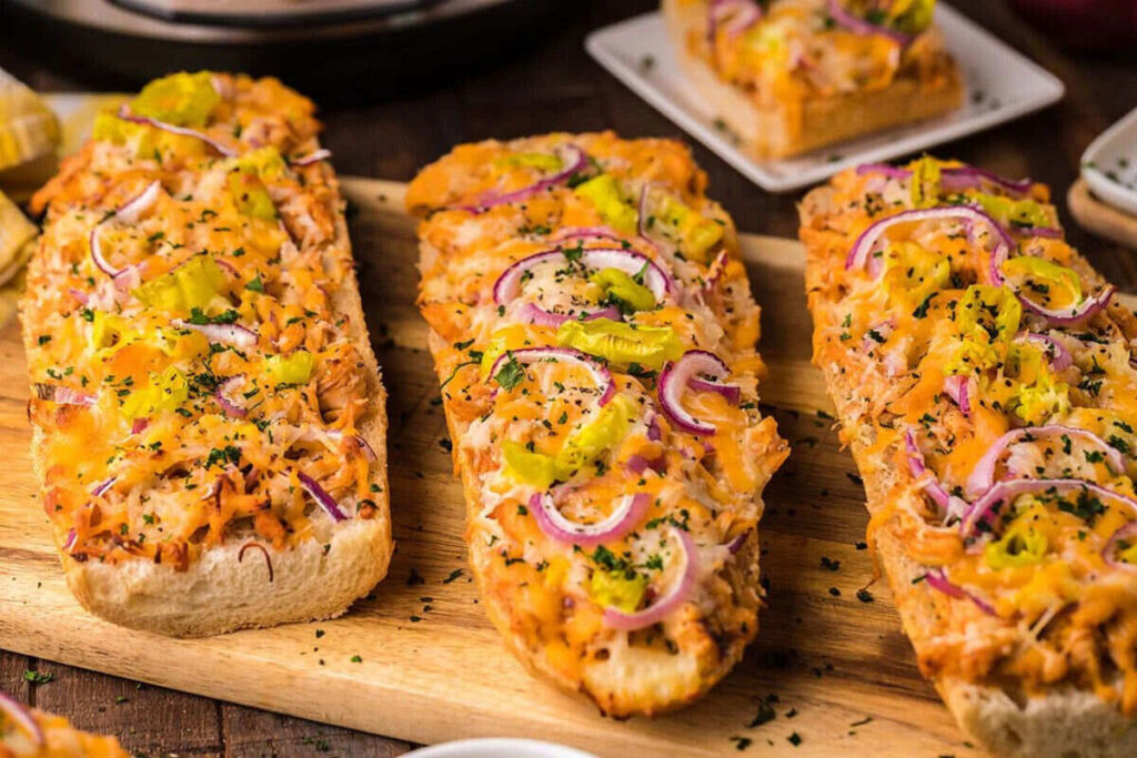 Quick Instant Pot dinner with cheesy toast, herbs, and banana peppers.