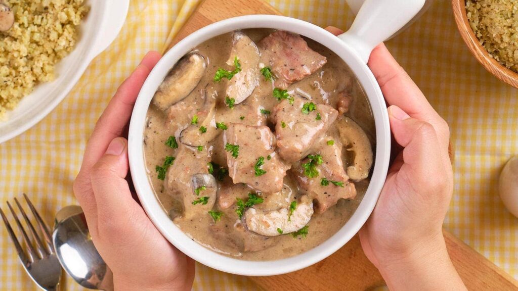 A bowl of beef stroganoff.