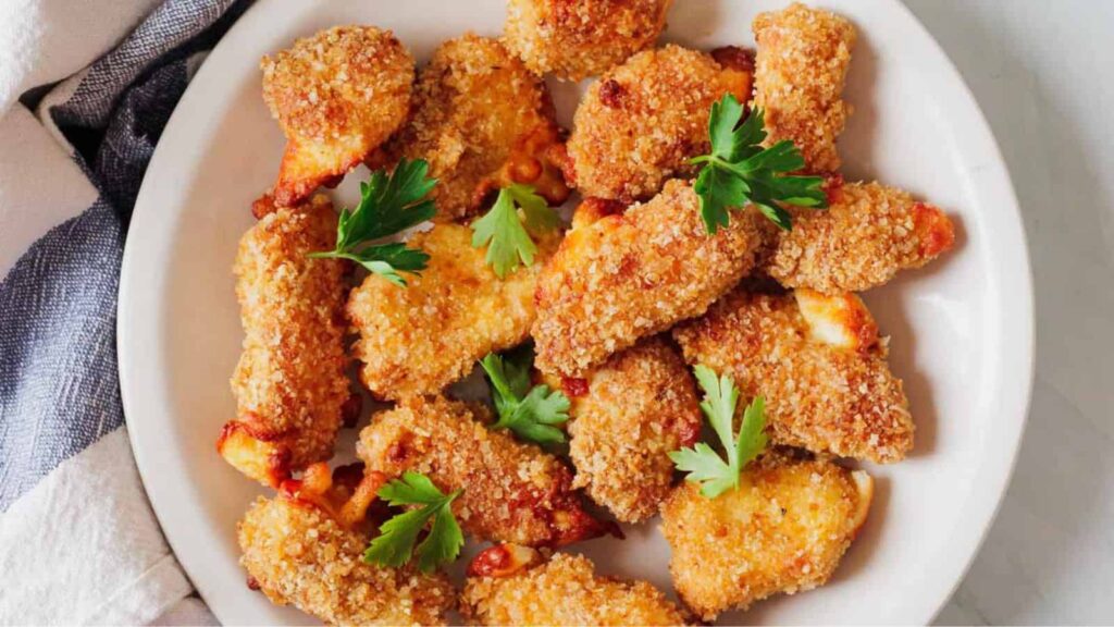 Air Fryer Cheese Bites cook quickly in the air fryer with a crisp exterior and soft center. This air fryer recipe takes about 15 minutes from start to finish, keeping snack cravings from turning into a takeout run. The air fryer method keeps prep simple and cleanup light. They disappear fast, usually before anyone asks what else is for dinner.
