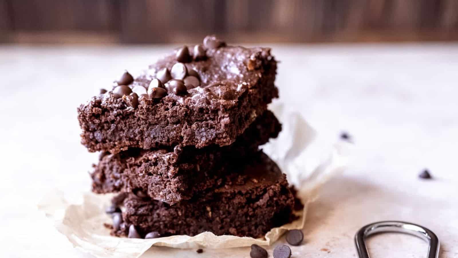 Three black bean brownies in a stac.
