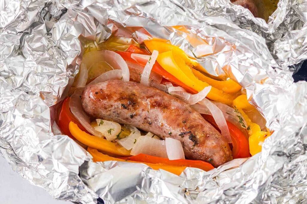 A campfire sausage and peppers foil packet.