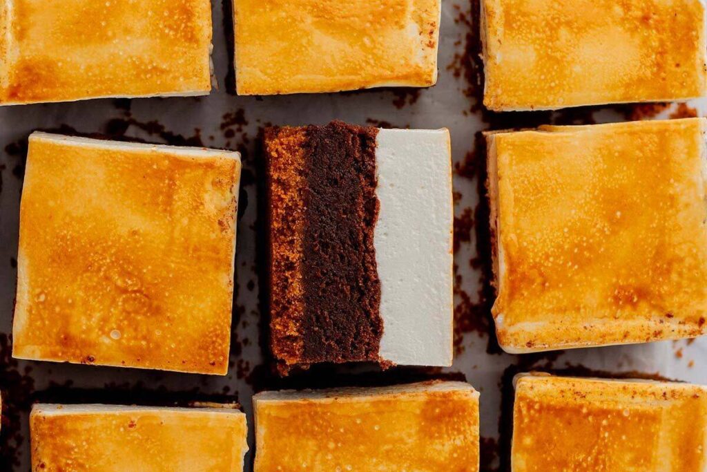 A close-up of s'mores brownies arranged in a grid. 