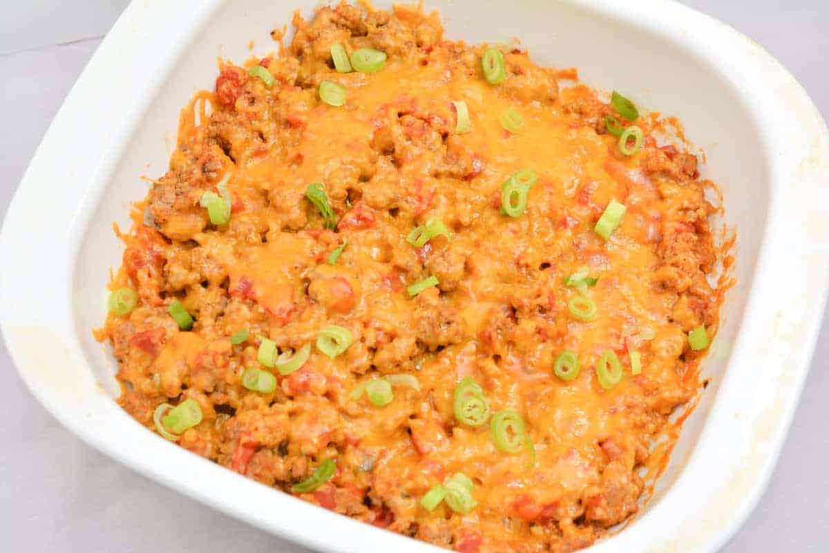 A casserole dish filled with meat and cheese.