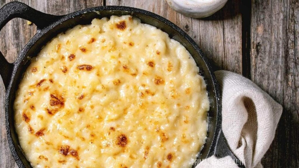 Mac and cheese in a black pot.