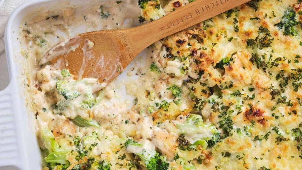 Chicken broccoli alfredo in a white baking dish.