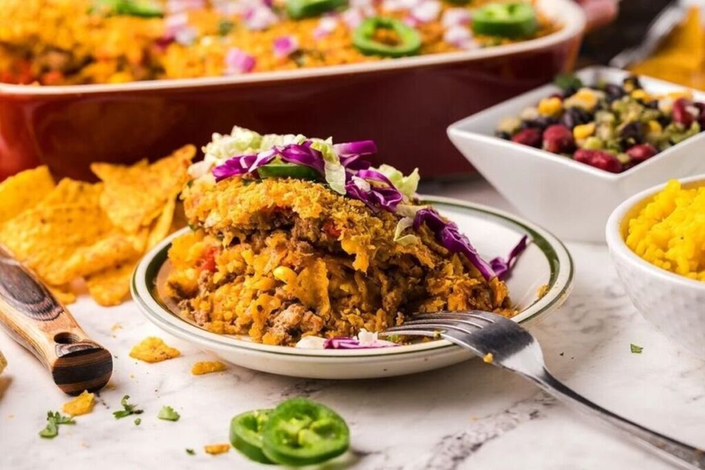 Cool ranch turkey taco casserole in a white dish.