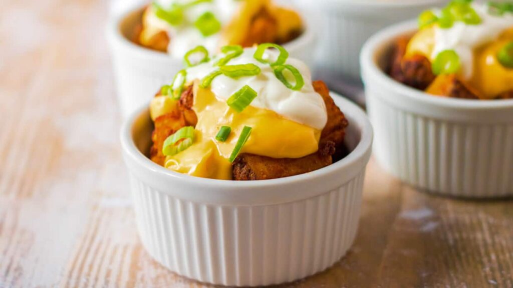 Cheesy Fiesta Potatoes rely on the air fryer to brown seasoned potatoes evenly in under 20 minutes. This air fryer recipe recreates a familiar fast-food favorite without leaving the kitchen. The air fryer gives the potatoes structure while warming the cheese through. It works as a quick dinner side that replaces a drive-thru stop.