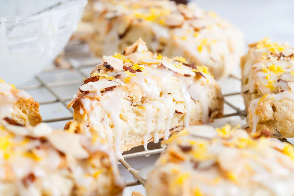 Lemon almond scones with glaze on top.