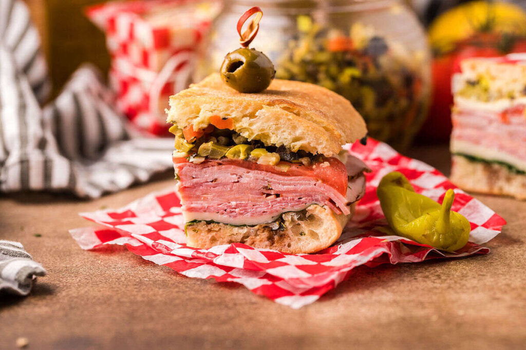 A side view of pressed Italian sandwiches.