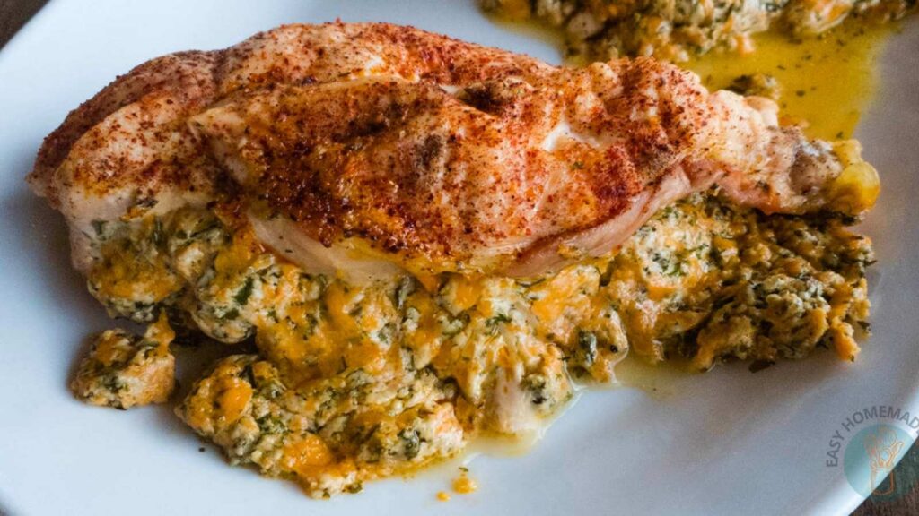 Ruth Chris stuffed chicken on a white plate.