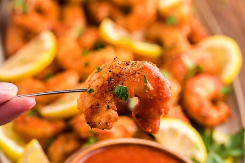 A close up of a shrimp with a rub.