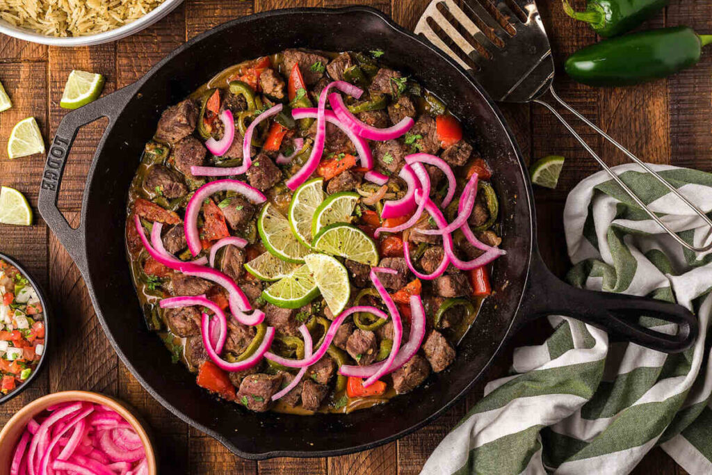 Food blogger Bella Bucchiotti of xoxoBella shares her cast iron skillet steak picado with pickled onions.