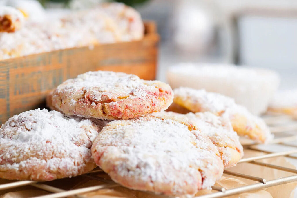 Pink lemonade cake mix cookies on a cooling rack.