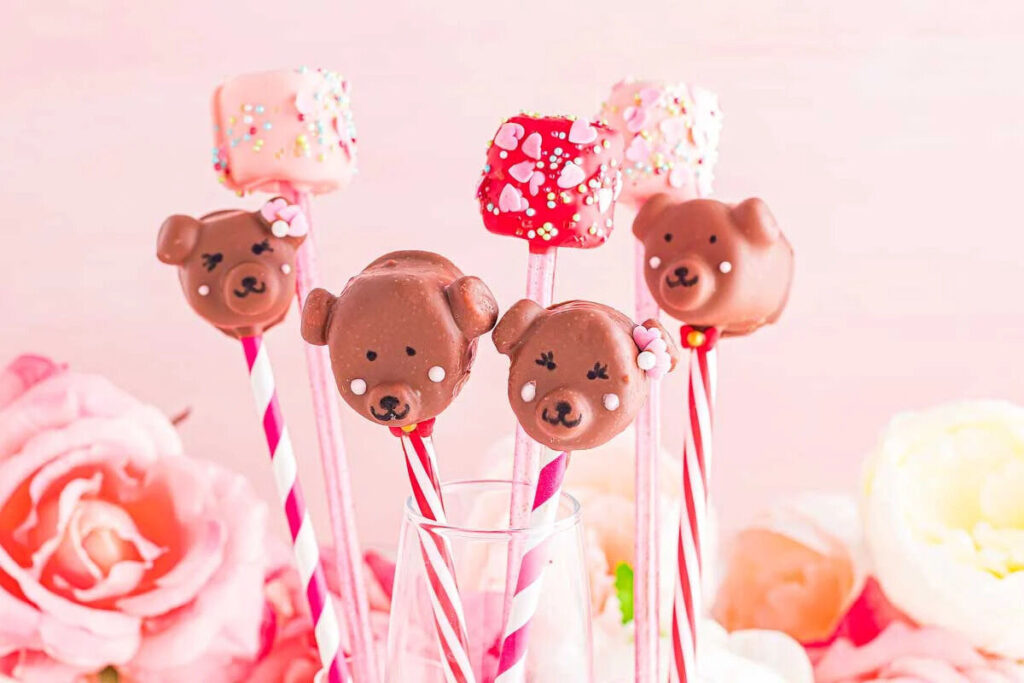 Bear and sprinkle cake pops with Valentine marshmallow pops make a sweet and charming centerpiece.