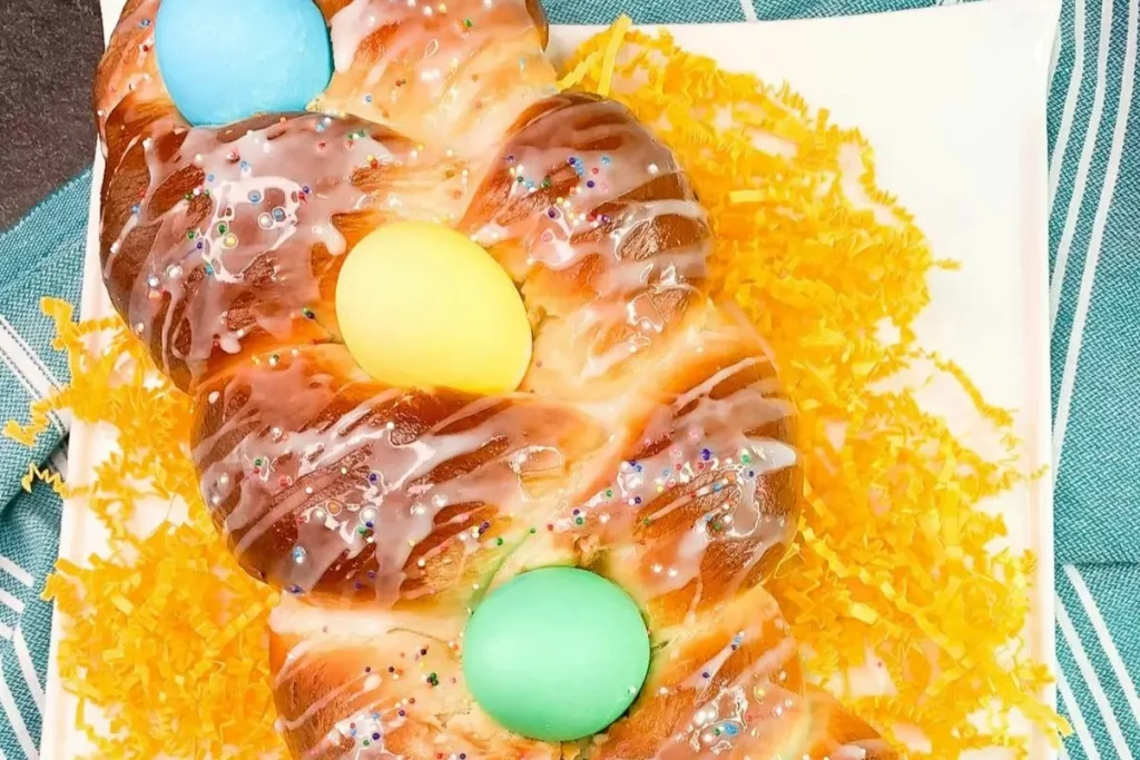 Braided Italian Easter bread with dyed eggs baked into the dough.