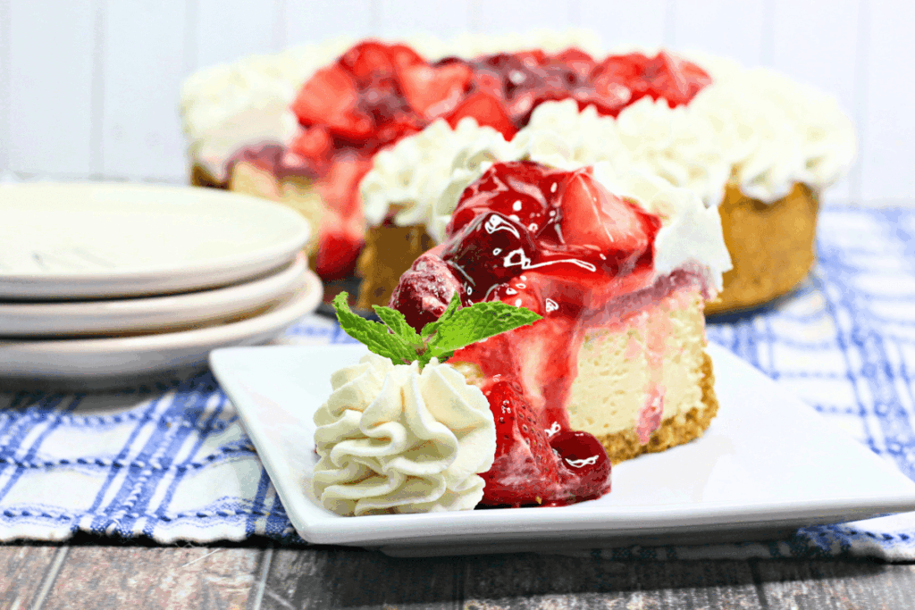 Strawberry Cheesecake on a white square plate.