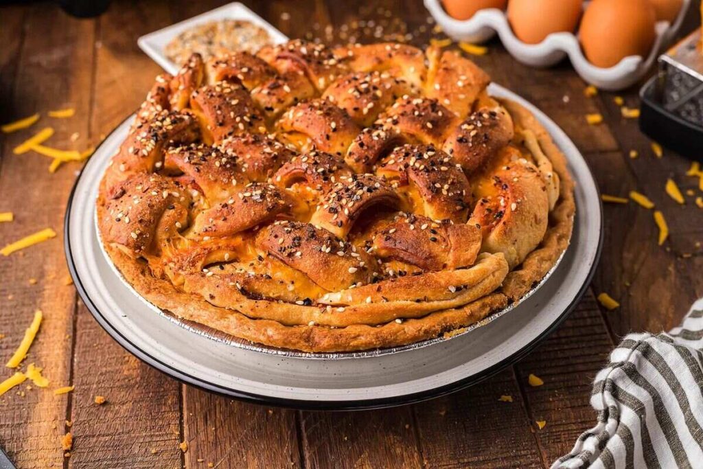  Ham and cheese quiche with a pie pan.