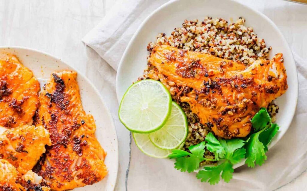 Blackened cod served with tri color quinoa.