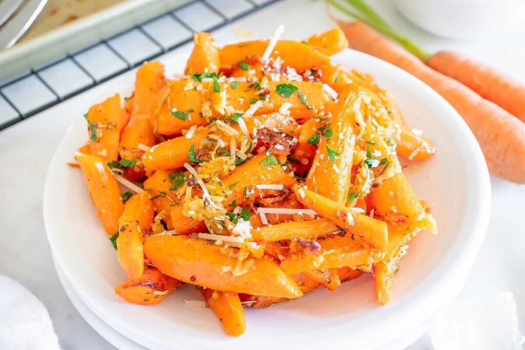 A plate with roasted carrots.