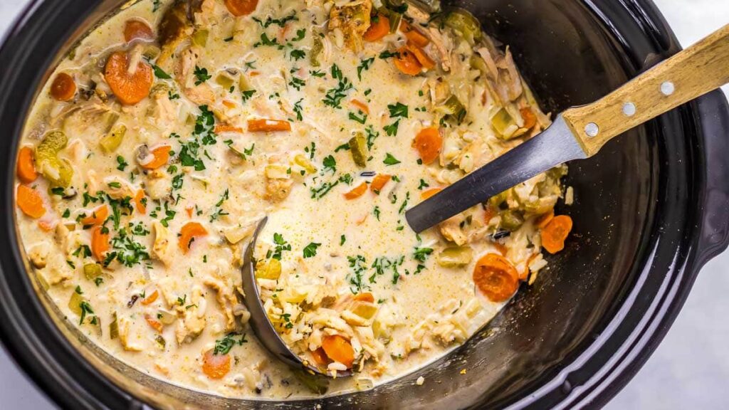 Slow Cooker Chicken and Rice Soup in a slow cooker.