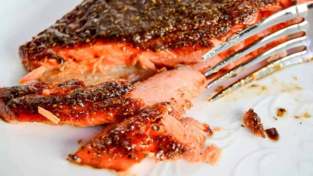 Cedar plank salmon seasoned with garam masala and grilled to a golden finish.