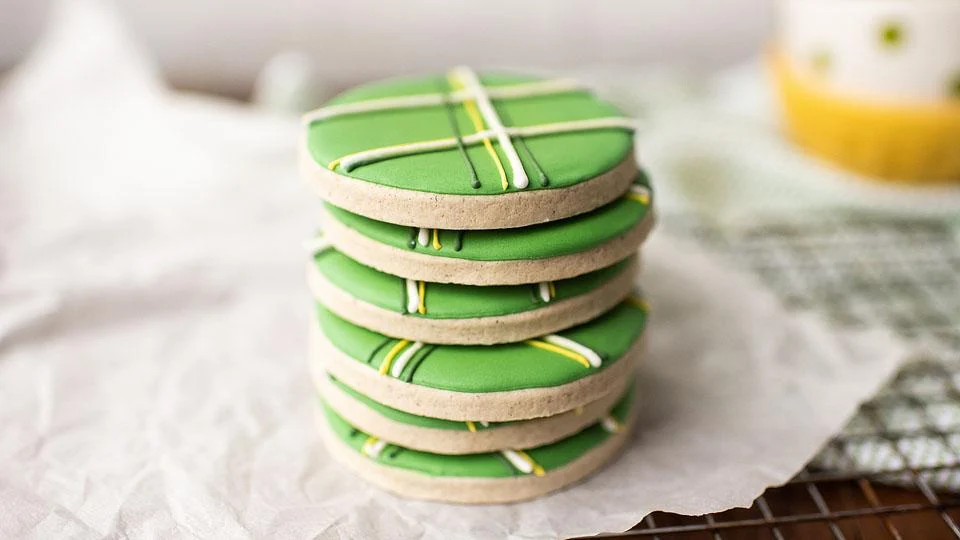 Iced St. Patrick’s Day sugar cookies decorated in festive green designs.