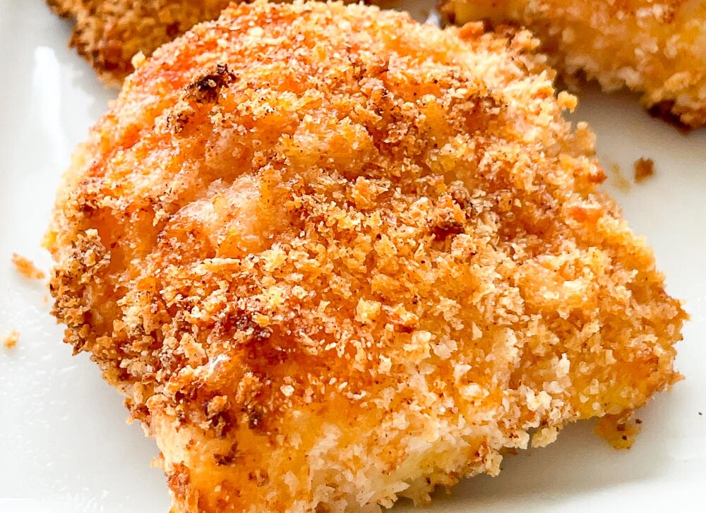 Close up of crispy coating on air fryer cod.
